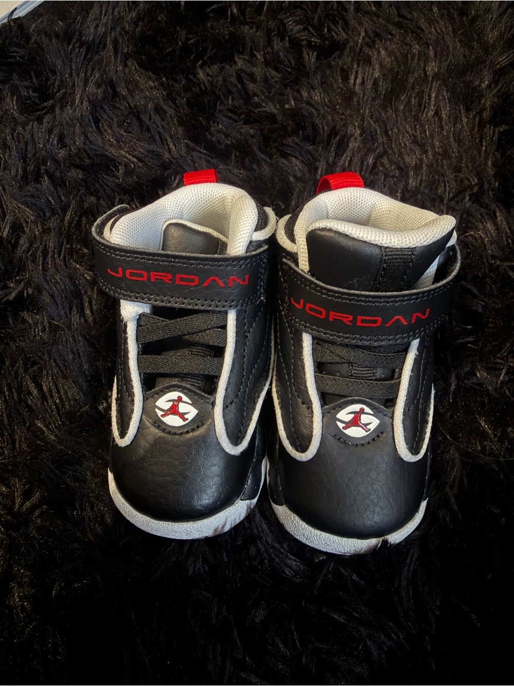 Jordan Kids Black and Red High-Top Sneakers with White Accents
